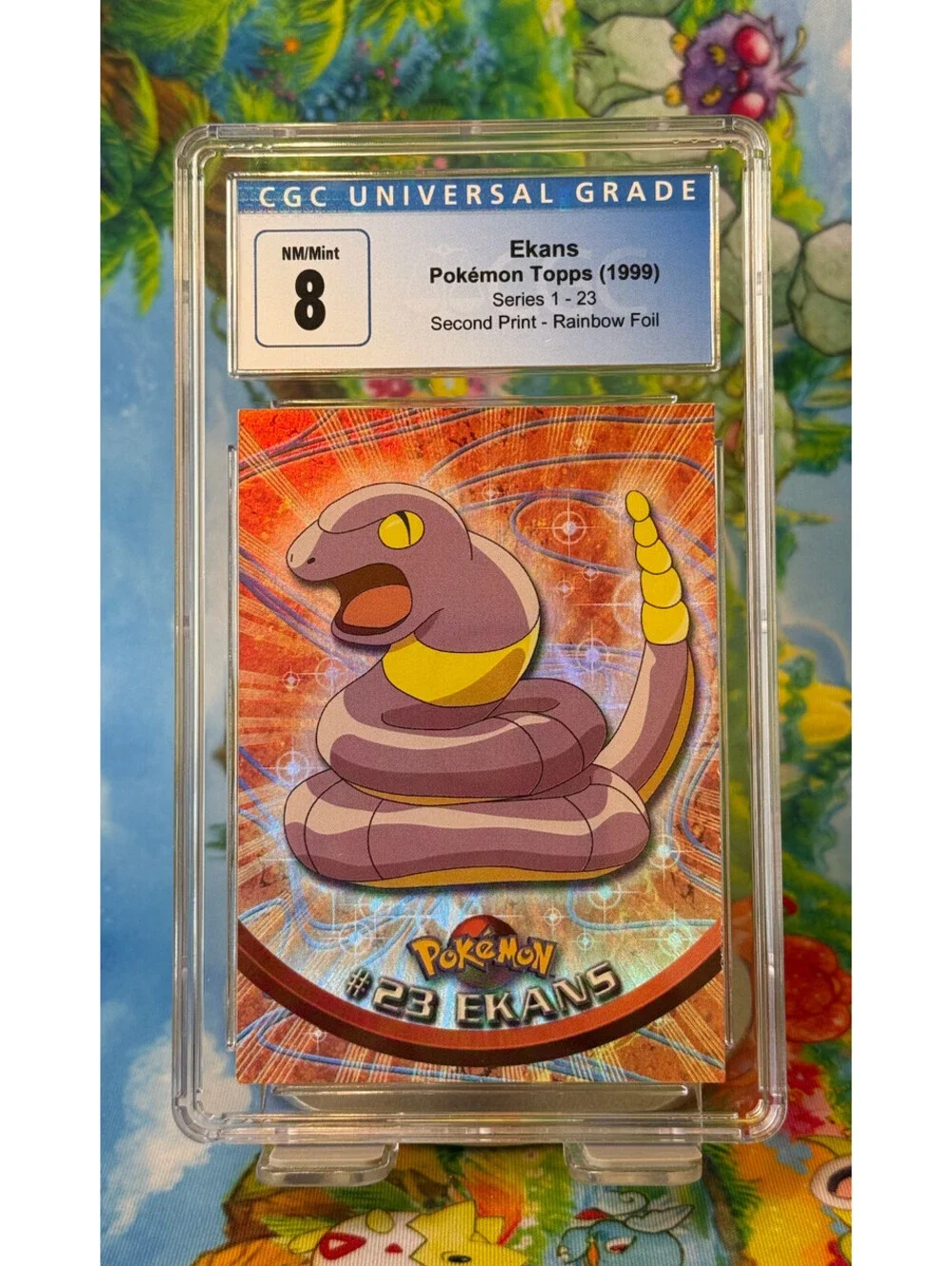 Ekans Pokémon Topps Series 1 No. 23 1999 Second Print Rainbow Foil CGC 8